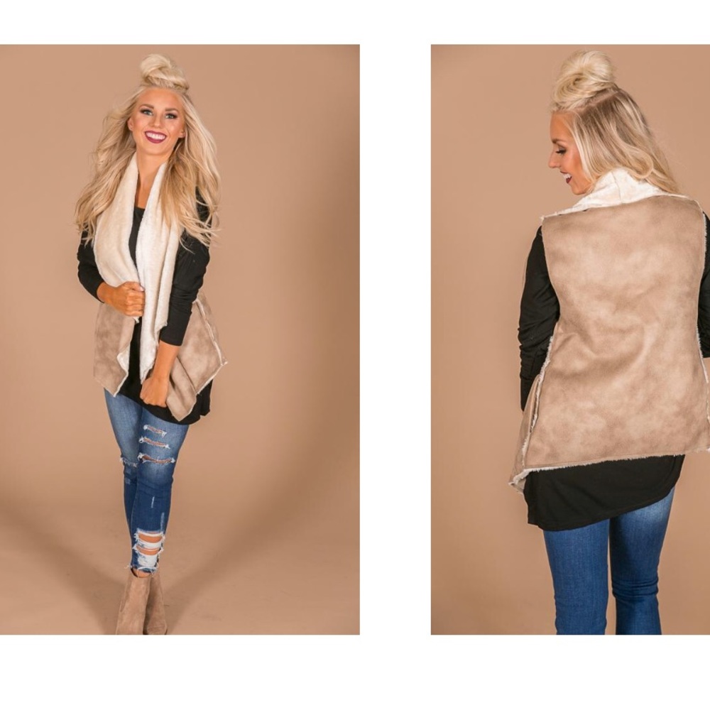 NEVER WORN FAUX FUR BOUTIQUE VEST